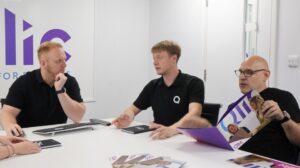 The Qlic Team having a meeting around Data Management
